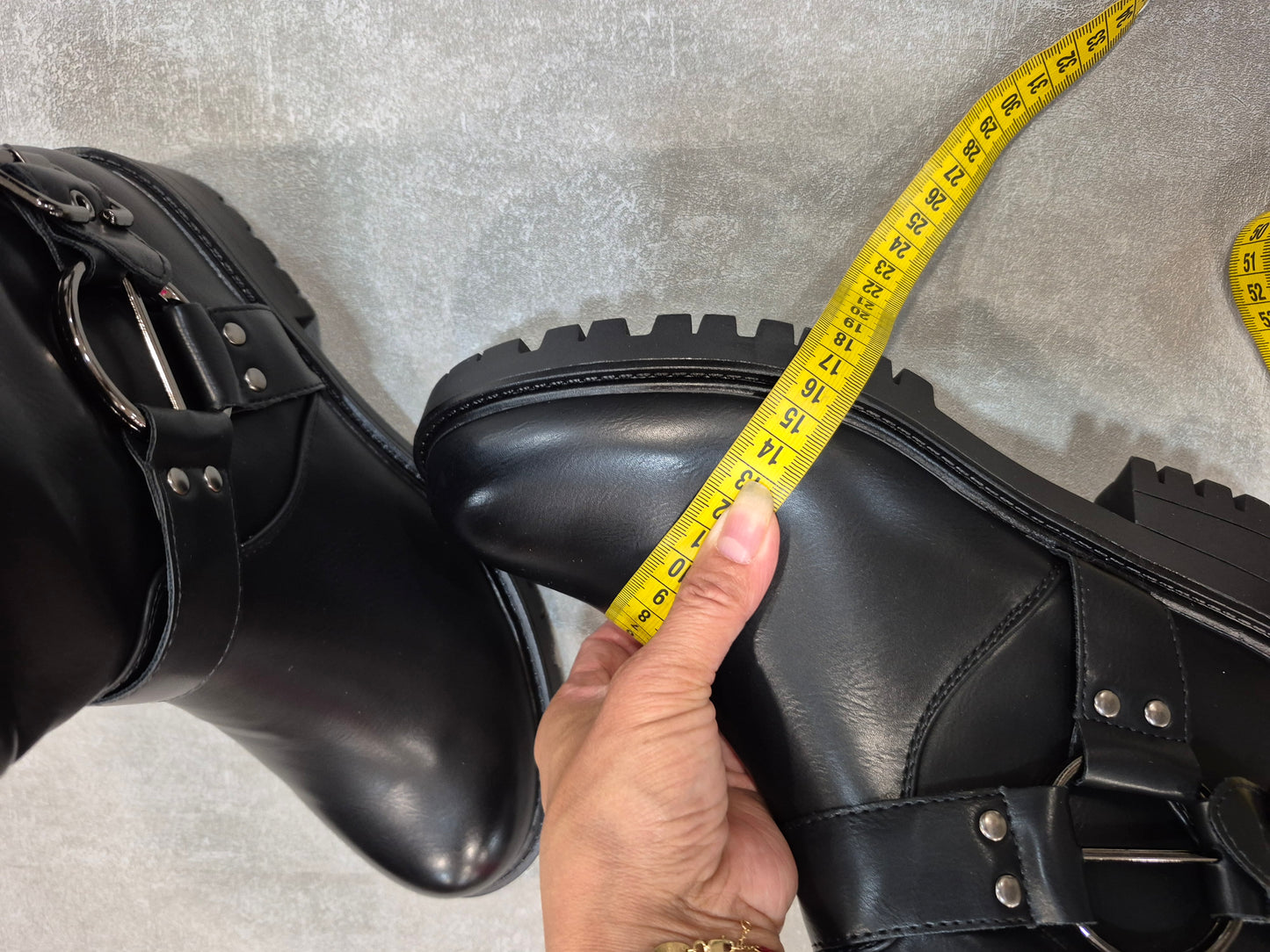 Women's black faux leather boots